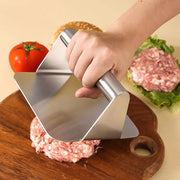 Stainless steel burger press for making non-stick meat patties in the kitchen