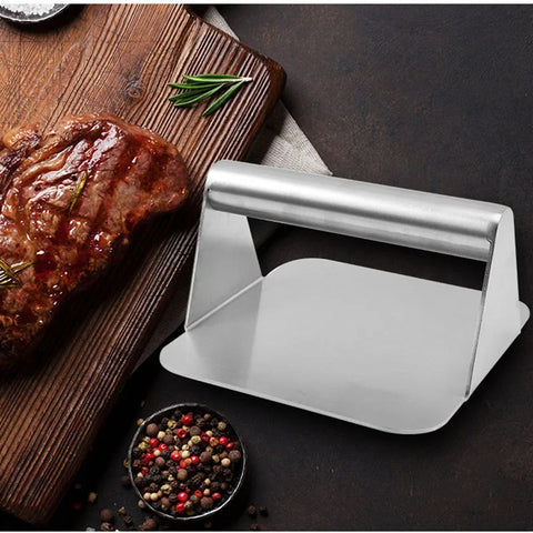 Stainless steel burger press for making non-stick meat patties in the kitchen